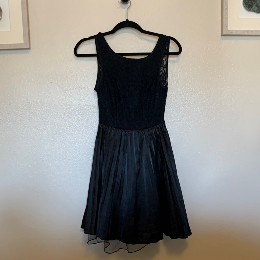 Backless black lace cocktail dress with side zip closure